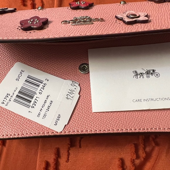 Small coach pink flower wristlet - Picture 2 of 5